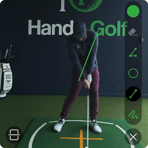 Alignment lines drawn over a golfer at address